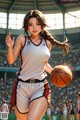 A woman in a basketball uniform holding a basketball.